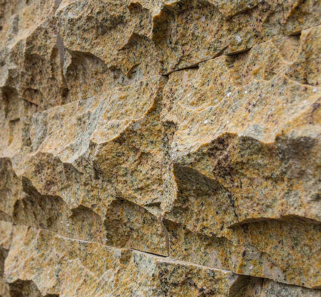 G682 Golden Granite for Gulf Villa Projects: Facade, Courtyard and Pool Coping in One Stone