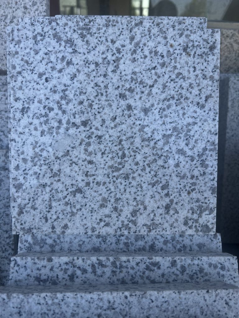 G603 white granite slab stacks