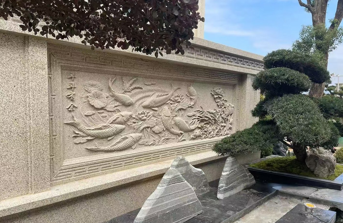 Carved G682 granite relief feature wall